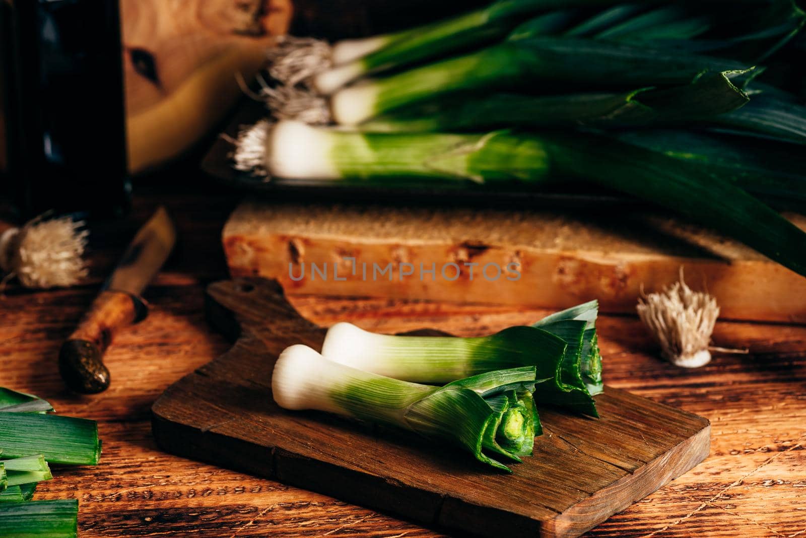 Fresh green leek on cutting board by Seva_blsv