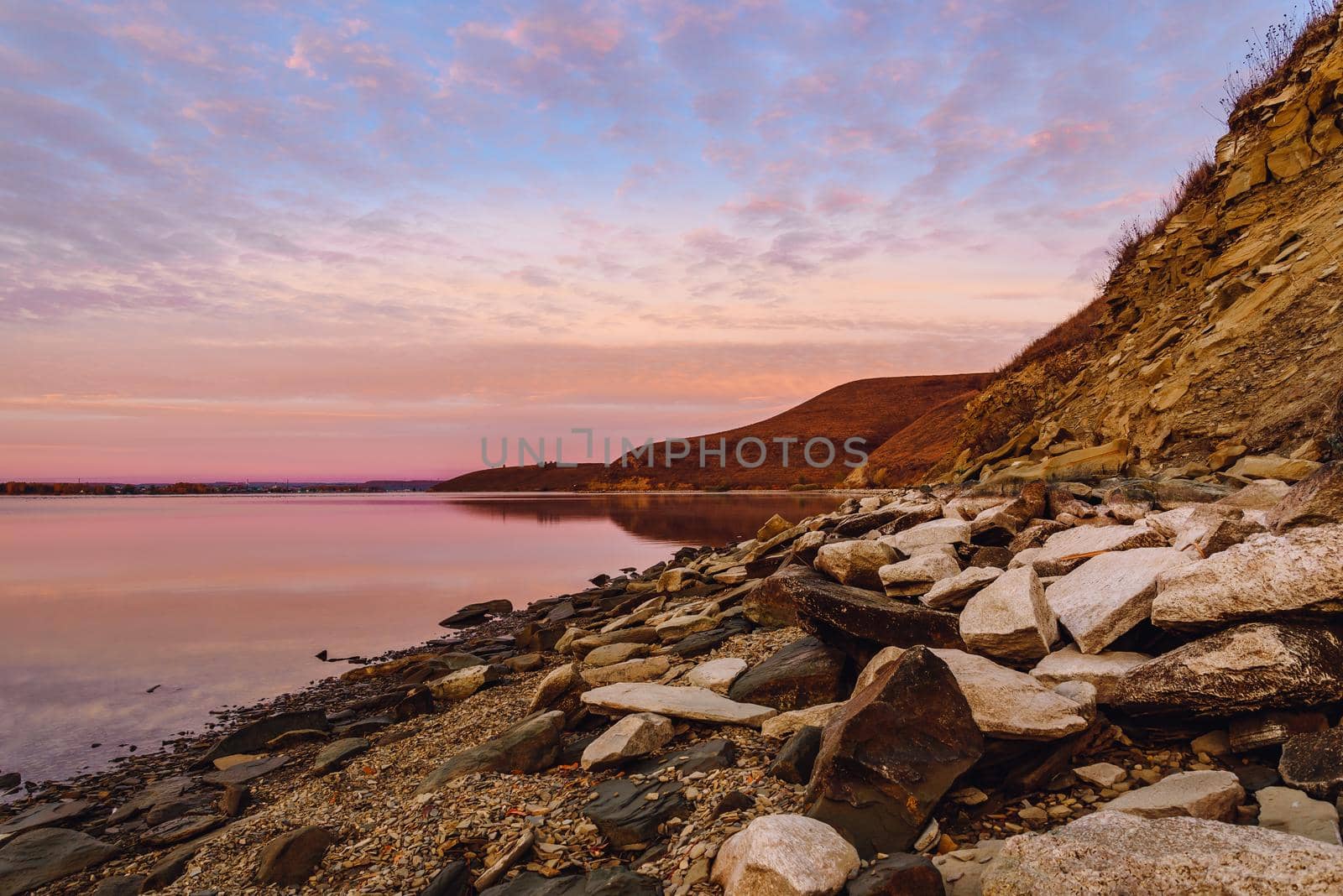 Autumn sunrise on the hilly coast of Zay river