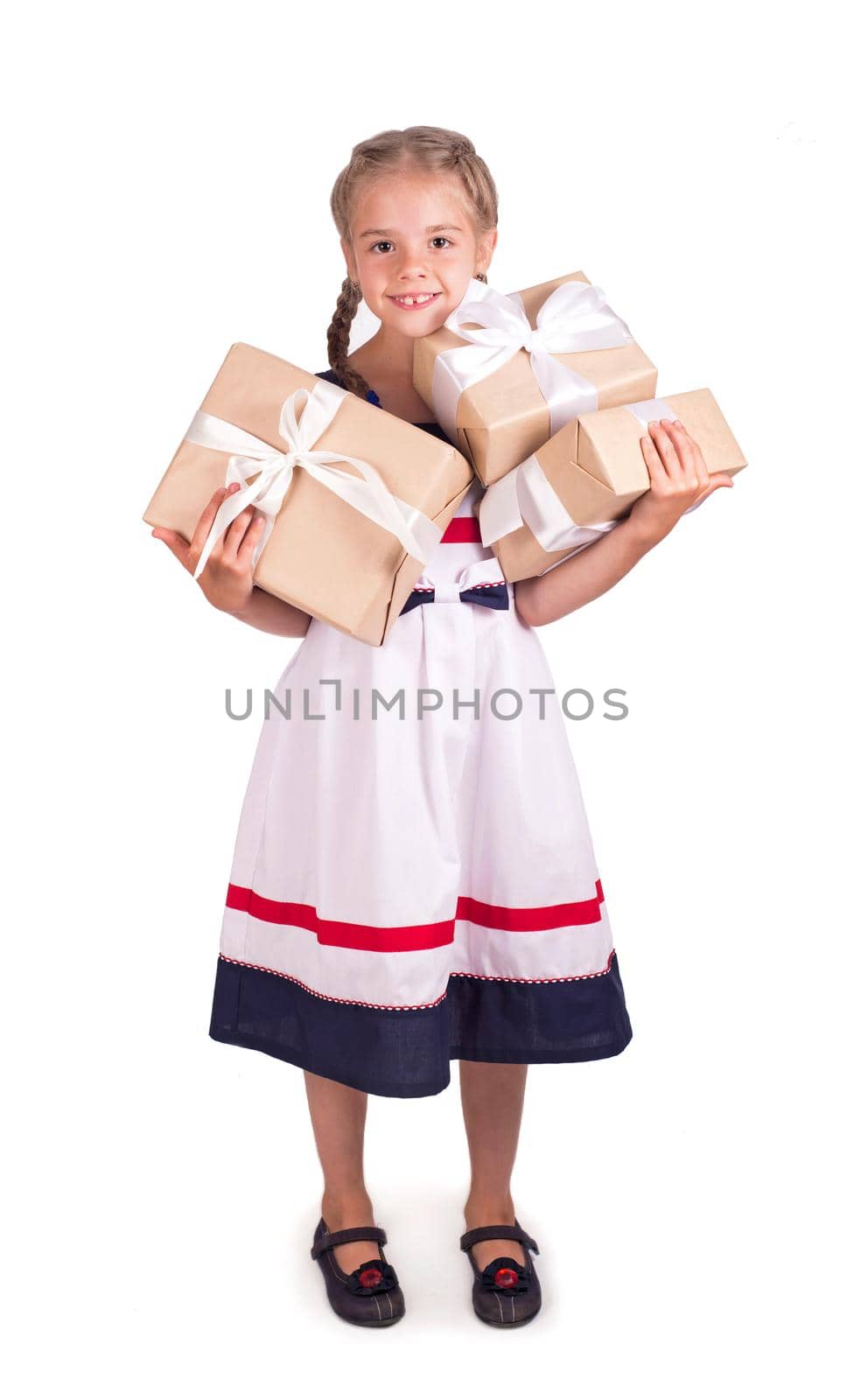 Portrait of little girl holding gift box isolated. by aprilphoto