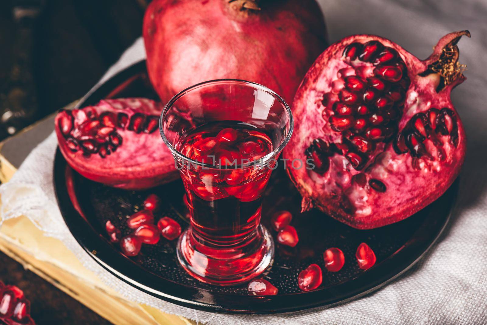 Cocktail with pomegranate fruit by Seva_blsv