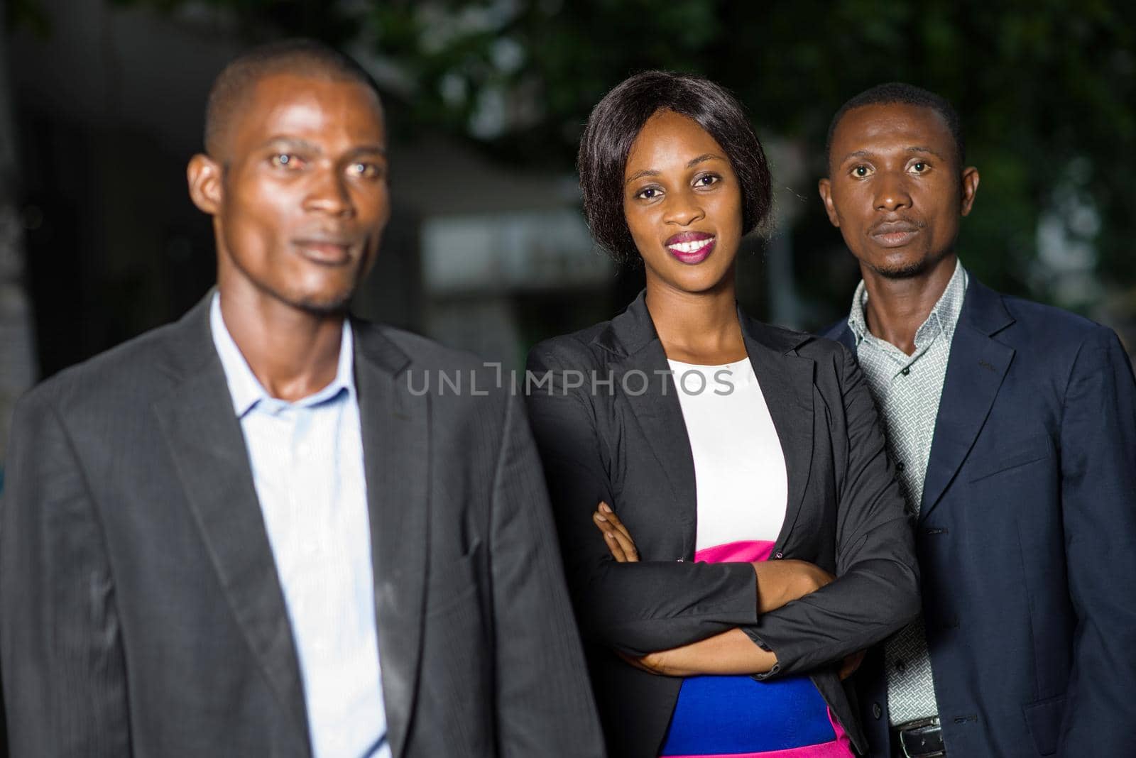 Modern team outdoors. Portrait of businessmen and businesswoman