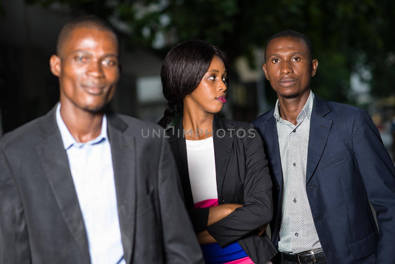 Modern team outdoors. Portrait of businessmen and businesswoman