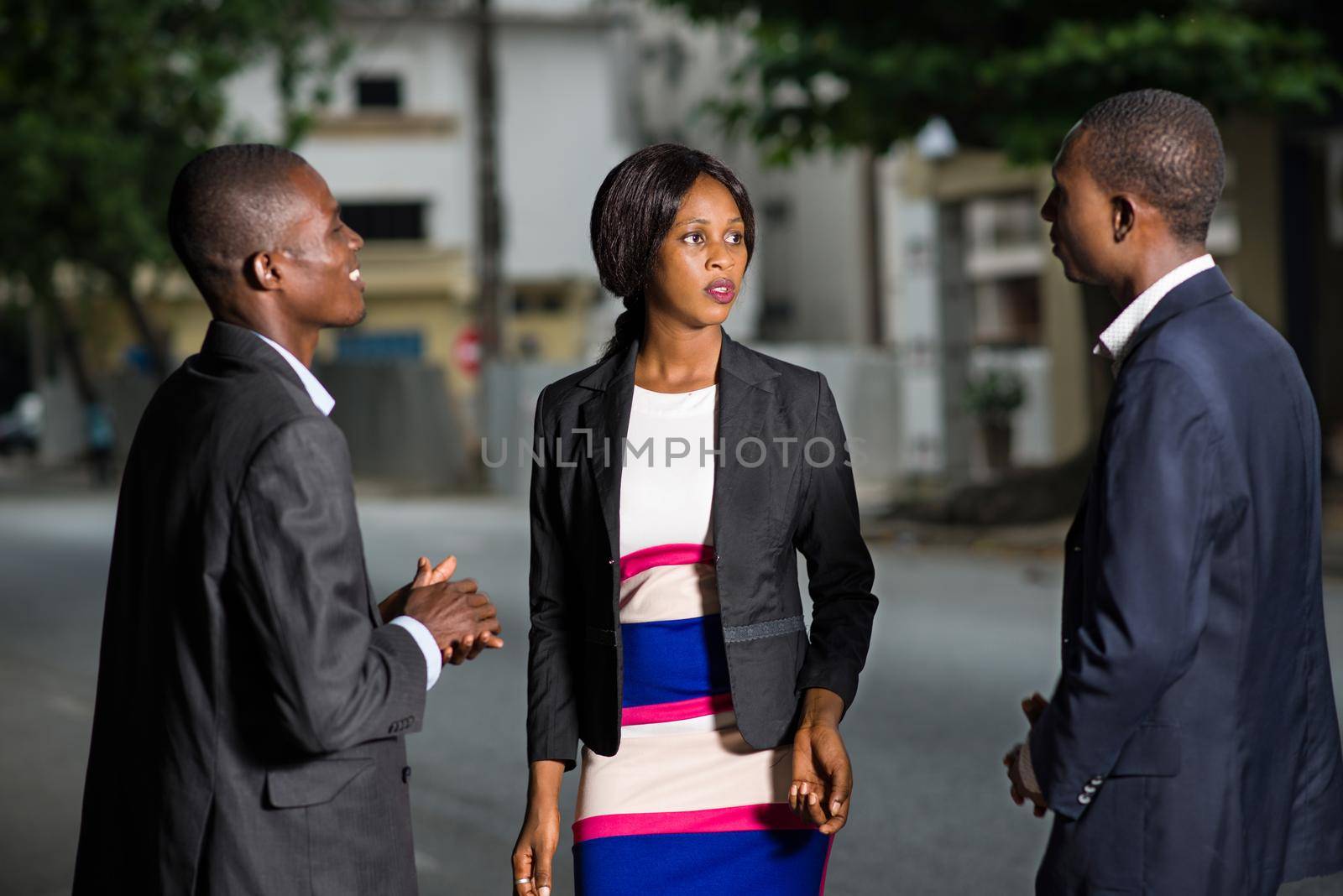. Concept of business mergers and partnership between business people discussing outside.