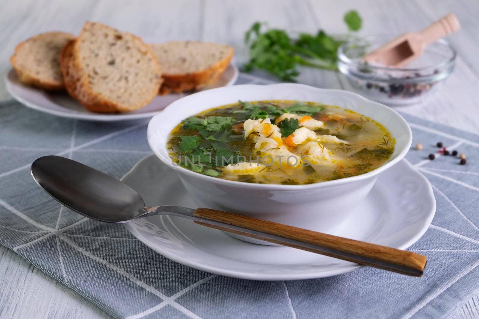 Close-up serving of vegetarian vegetable soup by OlgaGubskaya