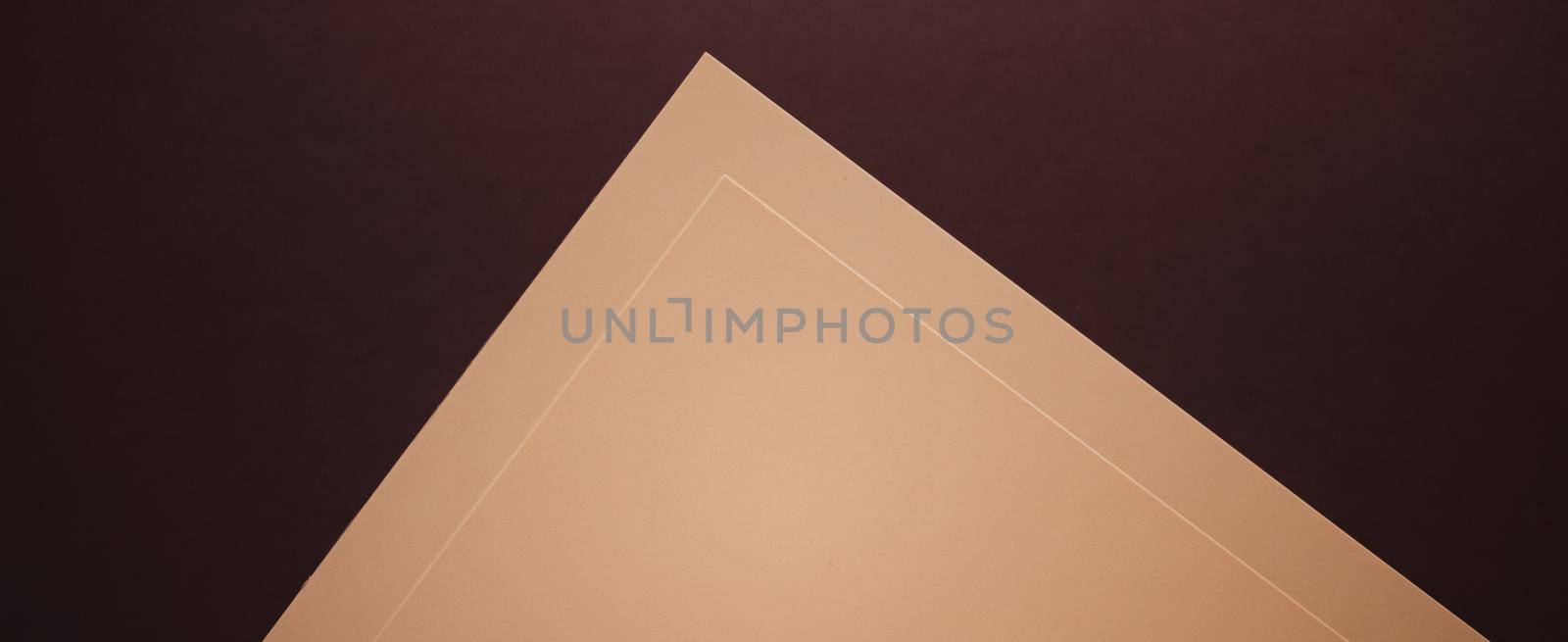Blank A4 paper, beige on dark background as office stationery flatlay, luxury branding flat lay and brand identity design for mockup by Anneleven