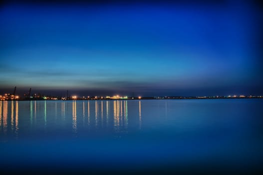 Night coastline, view from the pier of Odessa Sea Port. Ukraine.