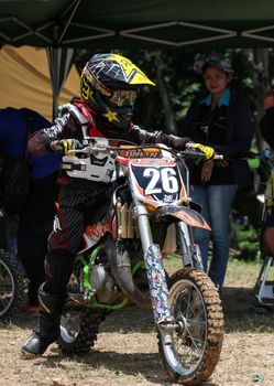 MUAKLEK, THAILAND - AUGUST 05: Unidentified rider participates in competition Supercross Championship of Thailand, on August 05, 2012 in Muaklek, Saraburi,Thailand