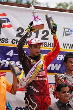 MUAKLEK, THAILAND - AUGUST 05: Unidentified riders participate in  competition Supercross Championship of Thailand, on August 05, 2012 in Muaklek, Saraburi,Thailand