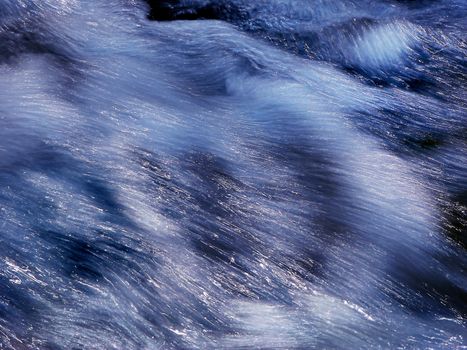 The speed and the energy of the water of a mountain river is caught with this frame.