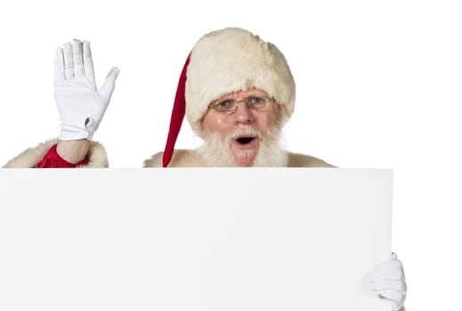 Portrait of Santa Claus holding a blank billboard on white background