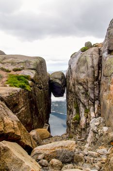 Kjeragbolten in Norway. Stone between two rocks