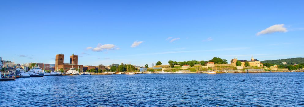 View on Oslo Fjord harbor, Oslo City Hall and Akershus Fortress, Oslo, Norway