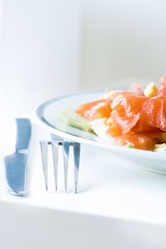 Salad with salmon and boiled eggs