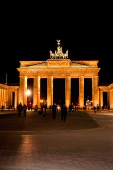 BERLIN - MARCH 19: The Brandenburg Gate (German: Brandenburger Tor) at night, is a former city gate, rebuilt in the late 18th century and now one of the most well-known landmarks of Berlin and Germany on March 19, 2011