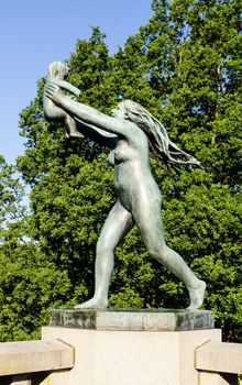 OSLO, NORWAY - JUNE 19: Statues in Vigeland park in Oslo, Norway on June 19, 2012.The park covers 80 acres and features 212 bronze and granite sculptures created by Gustav Vigeland.