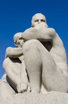 OSLO, NORWAY - JUNE 19: Statues in Vigeland park in Oslo, Norway on June 19, 2012.The park covers 80 acres and features 212 bronze and granite sculptures created by Gustav Vigeland.