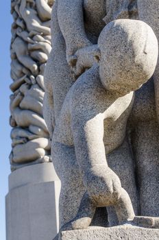 OSLO, NORWAY - JUNE 19: Statues in Vigeland park in Oslo, Norway on June 19, 2012.The park covers 80 acres and features 212 bronze and granite sculptures created by Gustav Vigeland.