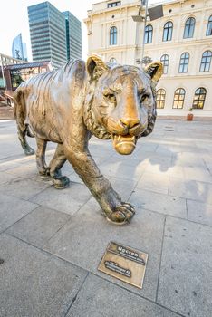 OSLO - AUGUST 27: Oslo has a nickname among Norwegians – Tiger City – an innocent reminder that scratches are inevitable when in the capital city. Bronze Tiger in city center on August 27, 2012 in Oslo, Norway.