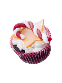 Cupcake with frosting candy cane and star toppings