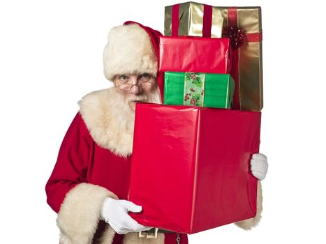 Portrait of santa claus with lots of gifts isolated on a white background