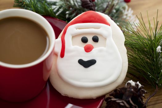 A serving of coffee and a cookie on holiday season 