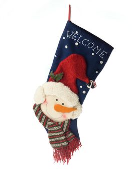 Close-up of christmas stocking displayed over white background.