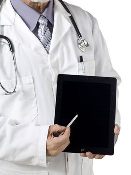 Cropped image of a senior male doctor with the camera focused on his touch pad tablet 