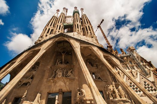 BARCELONA, SPAIN - JULY 13: La Sagrada Familia - the impressive cathedral designed by Gaudi, which is being build since 19 March 1882 and is not finished yet July 13, 2009 in Barcelona, Spain.