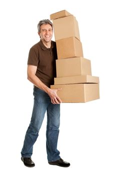 Delivery man carrying stack of boxes. Isolated on white