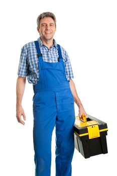 Confident service man standing with toolbox. Isolated on white