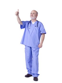  Portrait of a male surgeon with an approved gesture and stethoscope on his shoulder against white background