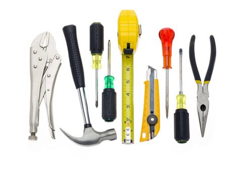 A bunch of tools hanging out on a white background