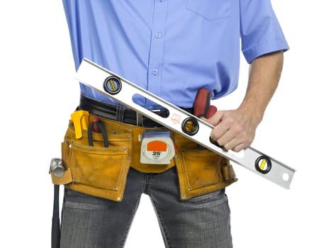 Construction worker with belt and holding a level ruler