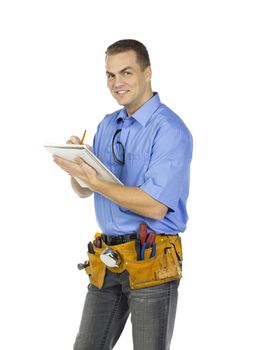 Close-up portrait shot of a happy construction worker making notes on writing pad. Model: Denis Bryzgounov