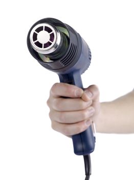 Cropped image of a hand holding an electric heat gun isolated in a white background