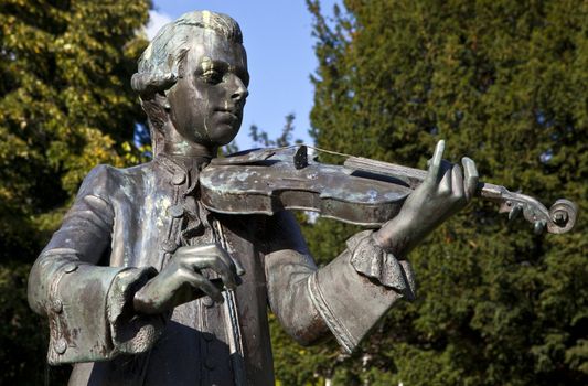 Young Mozart statue located in Parade Gardens. in Bath, Somerset.