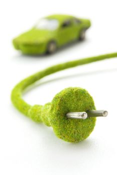 green electric plug with eco car icon, save energy concept
