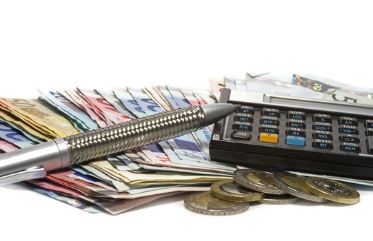 financial calculator with pencil and euro money paper
