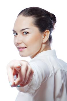 smiling woman shows finger isolated on white background.