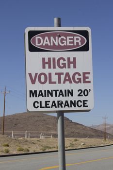 danger high voltage maintain 20' clearance