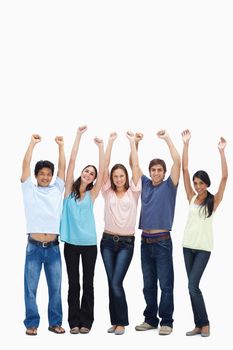 Customers raising their arms against white background