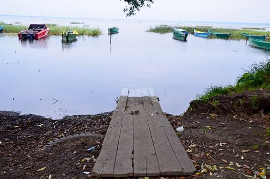 Kind on descent to boat station on lake, Yaroslavl region