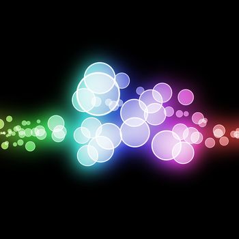 Multicolored circles melding together against a black background