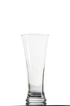 Empty glass against a white background