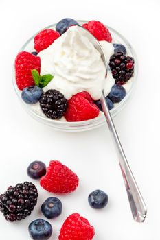 Dessert of berries against a white background