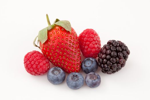 Fruits laid out together against a white background