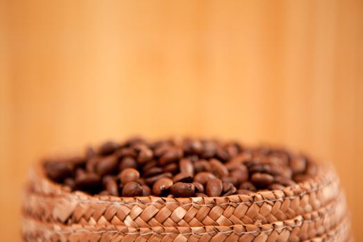 Close up of the top of a basket full of coffee seeds