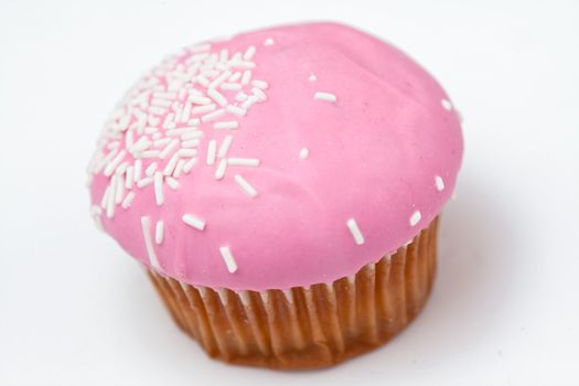 Pink cupcake against a white background