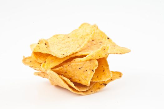 Little stack of crisps against white background 