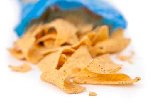 Open bag of crisps against blurred background